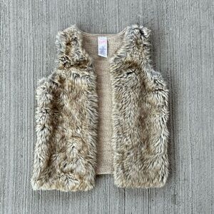 Wonder Nation Y2K faux fur vest with a tan and cream and grey colour combination